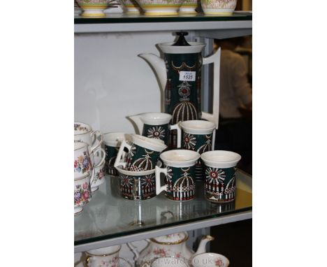 A Portmeirion 'Magic City' part coffee set including six cups and saucers, a sugar bowl, milk jug and coffee pot, some a/f.