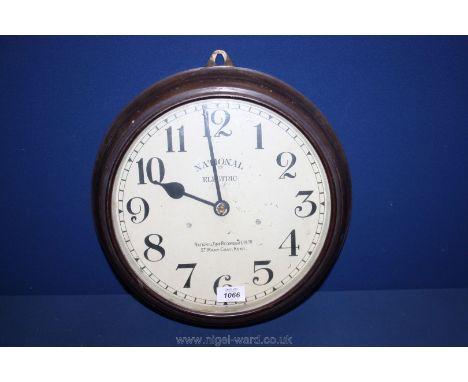 An electric 1930's railway waiting room Clock, signed National Time Recorder Co. Ltd.
