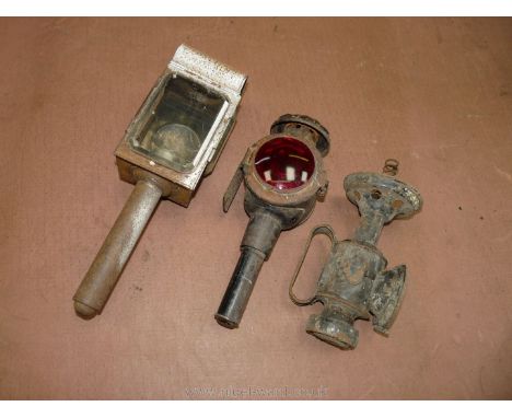 A rectangular iron coaching Lamp, circular iron coaching Lamp with red glass and one blackout iron coaching Lamp, all a/f.