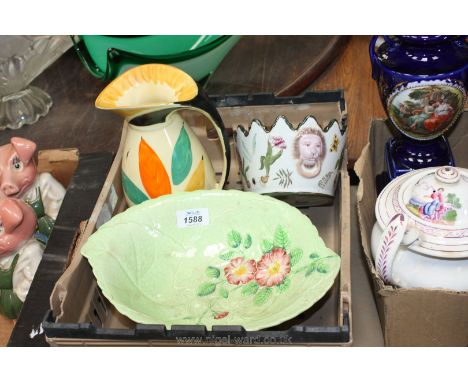 A box of china including green Carltonware bowl, green/yellow vintage pitcher and a small Lion dish with pointed rim.