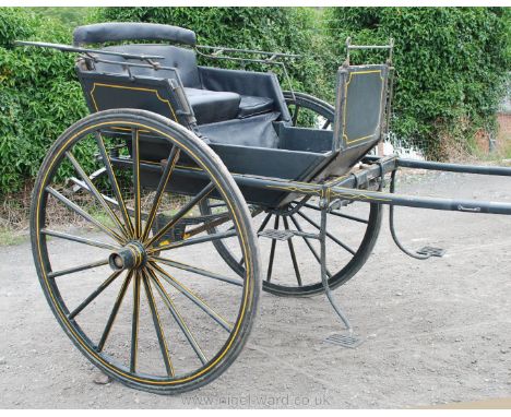 An easy access Trap having three convenient access steps to either side black, gold coach-lined paintwork, 48 3/4'' diameter 