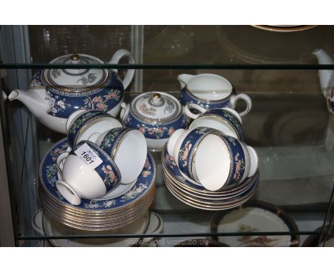 A Wedgwood ''Blue Siam'' Teaset comprising six cups, saucers and tea plates,  sucrier, milk jug and large teapot.