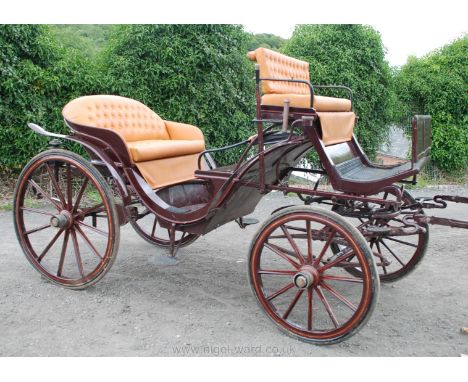 A good Phaeton painted in Royal Claret coach-lined in red and gold having wrought iron oval plate access steps to either side