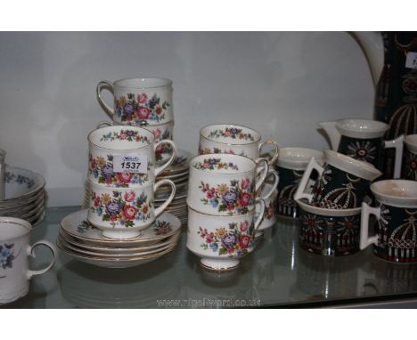 A Paragon 'Lavina' Teaset consisting of eight cups and saucers and eight side plates.