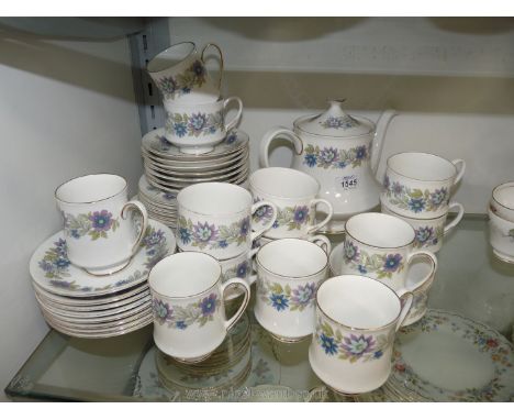 A Paragon coffee and tea service in Cherwell pattern consisting of 10 side plates, 15 saucers, six coffee cups, seven tea cup