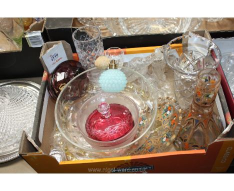 A quantity of clear and coloured glass including cranberry trinket pot, trifle bowl, shell pattern plate, perfume bottles etc