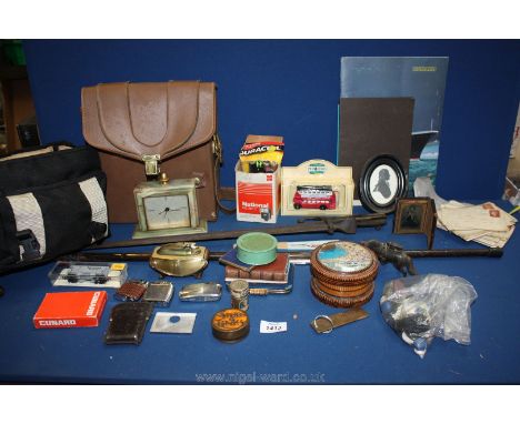 A quantity of miscellanea including Cunard guest list, playing cards, German made onyx clock, fire tongs, walking cane, Bell 