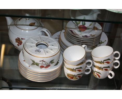 A Royal Worcester 'Evesham' part Tea and dinner service including six cups and saucers, tea plates, six salad plates, dinner 