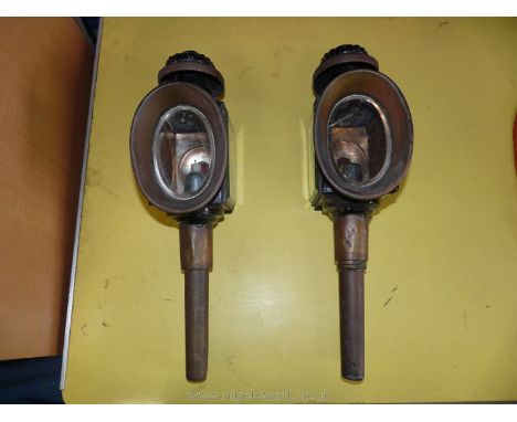 A pair of brass and iron carriage Lamp with candles, a/f.