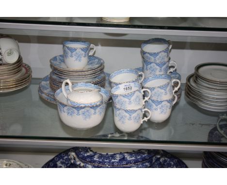 A thirty-seven piece blue/white tea service circa 1935-1940, including sugar bowl, milk jug, two large plates, nine tea cups,