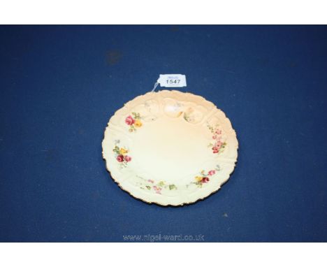 A Royal Worcester porcelain blush ivory Plate in elaborate baroque shape with hand painted flowers and leaves 7" diameter, da