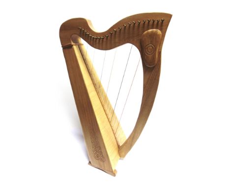 A 'MINSTREL' HARP, BY R. &amp; J. BURKE  labelled to the interior, the soundbox with carved Celtic-style knotwork decoration,