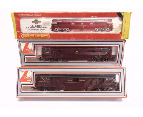 [OO GAUGE]. THREE B.R. DIESEL LOCOMOTIVES  comprising a Lima No.L205121, B.R. Express Parcels bo-bo diesel railcar, lined mar
