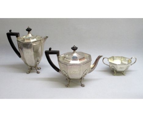 A SILVER PART TEA SERVICE COMPRISING A TEAPOT (615g), A HOT WATER POT (637g) AND A SUGAR BOWL (196g) BY FENTON RUSSELL & CO. 