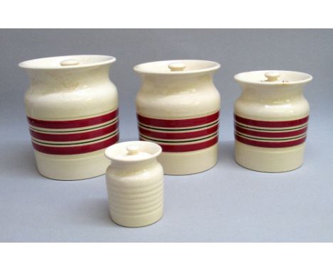 AN UNUSUAL SET OF THREE T.G. GREEN & CO. LTD RUBY RED AND BLACK BANDED STORAGE JARS (TALLEST: 18.5cm) TOGETHER WITH A SMALL C