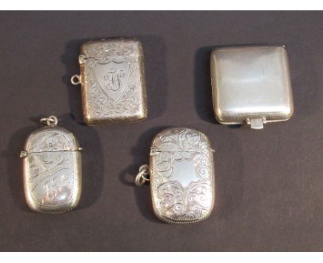 THREE EDWARDIAN SILVER VESTA CASES AND AN EMPTY SILVER GEORGE V TRAVELLING CLOCK CASE (82.5g) [4]