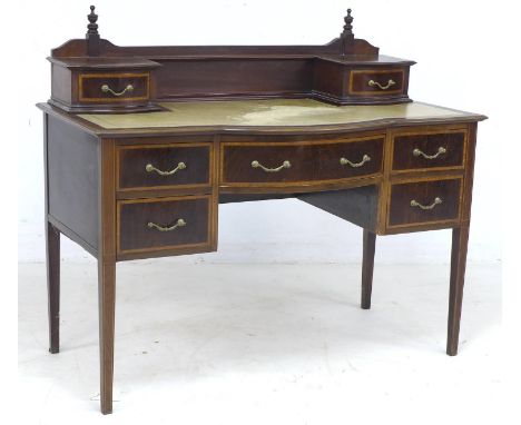 An Edwardian mahogany, line inlaid and crossbanded desk, upstand with two trinket drawers over a gilt tooled cream leather in