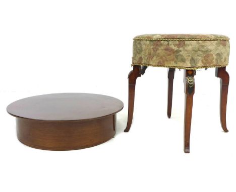 A late 19th century Continental convertible stool table, with lift off circular mahogany veneered surface, 56 by 56cm over a 