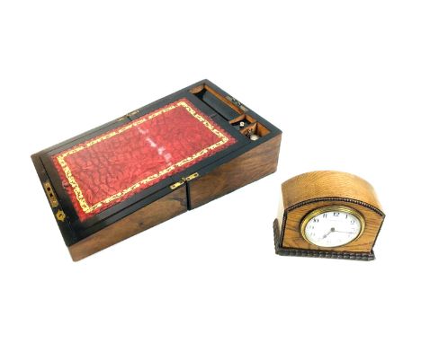 An early 20th century writing slope in burr walnut, with original ink bottle, a/f, 30 by 22.5 by 15.5cm high, and a 1930s oak