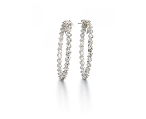 CHOPARDDiamant-Creolen. Herkunft: Frankreich. Datierung: um 2010. Material: 750/- Weißgold, Punze. Gesamtgewicht: ca. 11,0 g.