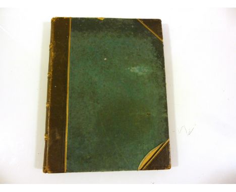 A Victorian photograph album circa 1880's containing approximately 75 mounted albumen print photographs, views include Toledo