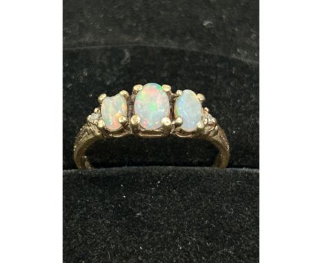 9ct Gold ring set with 3 opals Size O 