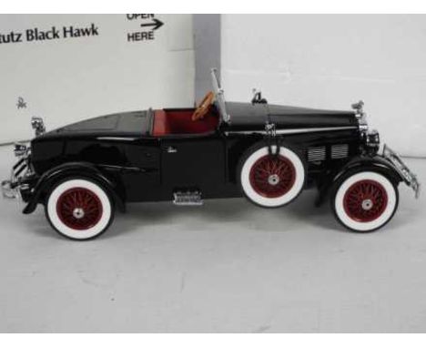 Danbury Mint - A boxed 1:24 scale 1927 Stutz Black Hawk by Danbury Mint. The model appears to be in Mint condition, housed in