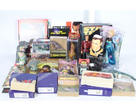 A mixed collection of four boxed diecast vehicles, a boxed Disney doll; a boxed Mattel action figure, with some unboxed Juras