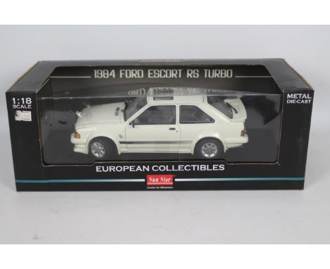 Sun Star - A boxed 1:18 scale 1984 Ford escort RS Turbo # 4961R. The car appears Mint in a Fair to Good box with some storage