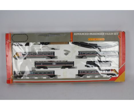 Hornby - A boxed 1980's Hornby OO gauge R543 Advanced Passenger Train Set. The five car set includes Power Car with pantograp