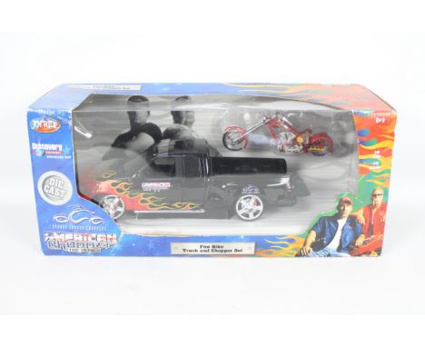 Ertl - Joyride - OCC - A boxed 1:18 scale American Chopper Fire Bike and Ford F Series truck # 37262. The models appear Mint 