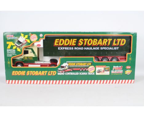 Control Freaks - A boxed 1;18 scale radio controlled 'Eddie Stobart Ltd.' Scania truck. The plastic model appears to be in Mi