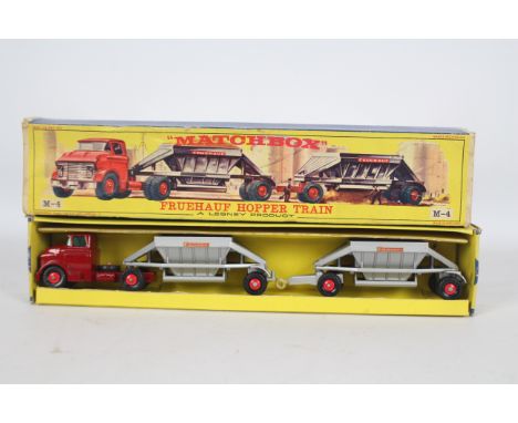 Matchbox - A boxed Matchbox Major Pack M4 Fruehauf Hopper Train. The model with maroon cab, silver hoppers with red plastic h
