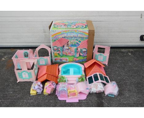 My Little Pony, Hasbro - A boxed vintage My Little Pony 'Paradise Estate' Playset. The set contains four rooms, a pool and pa