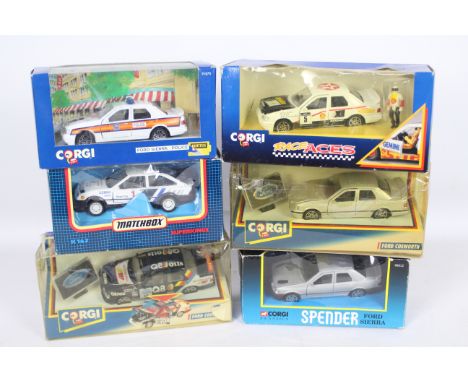 Corgi - Matchbox - 6 x boxed Ford Sierra Cosworth models in 1:36 scale including Sapphire Police car # 91870, Spender car # 9