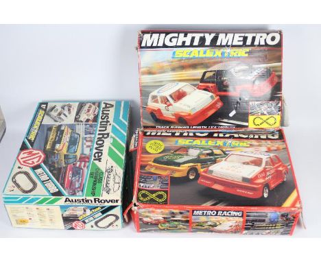 Scalextric - 3 x boxed MG Metro boxed sets with cars, # C.580 Mighty Metro, # C.552 Metro Racing, # C652 Austin Rover Class C