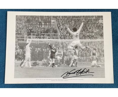 Norman Hunter signed 20x13 black and white print Norman Bite Yer Legs Hunter leaps for joy as Allan Clarke scores the goal th