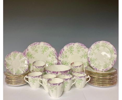 Ceramics - a Foley china 33 piece tea service decorated with floral patterns, comprising tea cups, saucers, cake plates, larg