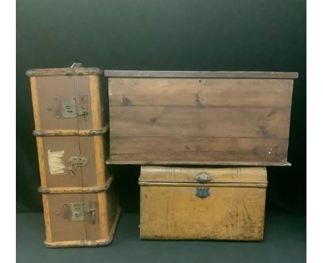 A metal trunk, hinged, domed cover; a travel trunk; a stained pine carpenter's box, hinged cover, removable compartment (3) 