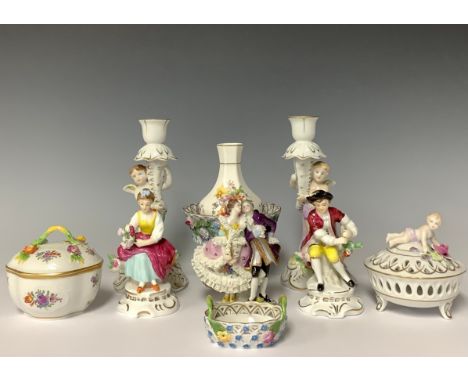 A Dresden porcelain shaped oval trinket pot and cover, moulded basket weave form, the cover applied with flowers in relief, p