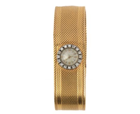 Zenith. Reloj de pulsera de dama en oro amarillo de 18 k. con vistas en oro blanco, esfera dorada con numeración de bastón or