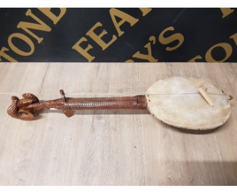 EXTENSIVELY CARVED BOSNIAN GUSLE ONE STRINGED INSTRUMENT WITH RAM HEAD FINIAL