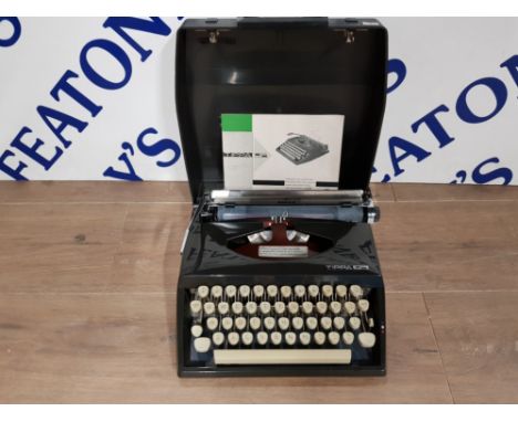 A VINTAGE PORTABLE TYPEWRITER BY TIPPA