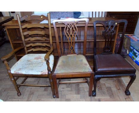 Two Chippendale and one ash and elm ladder back open arm chair Condition reports are not available for this sale.