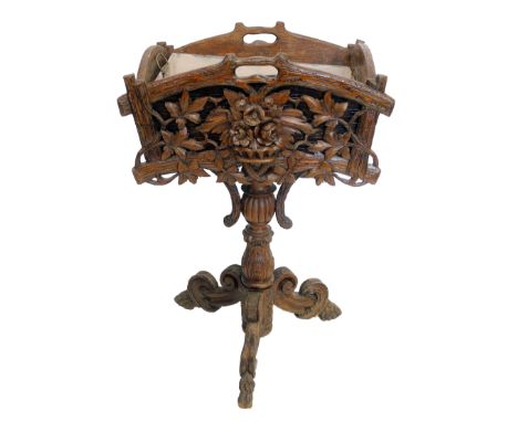 19th century black forest planter, rectangular top section carved and pierced with trailing vines and basket of flowers, tole