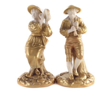 Pair of Royal Worcester figures of musicians, decorated with overall gilding, date codes for 1922, (2) 16cm high No damage or