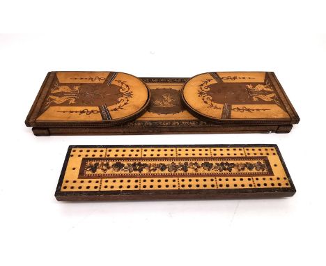 An early 20th century marquetry folding book slide and cribbage board. The book slide with classical design, featuring a putt