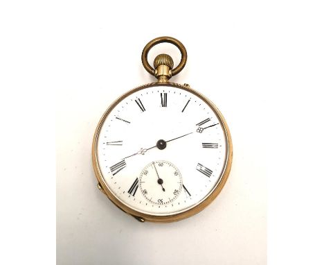 A 14 carat yellow gold Remontoir 15 rubis pocket watch with white enamel dial and black roman numerals. Inner plate also 14K,