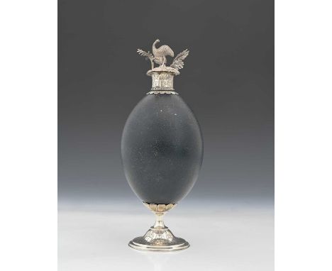 Australia.A nineteenth-century Australian emu egg inkwell, mounted in silver-coloured metal, of ovoid and circular form, with