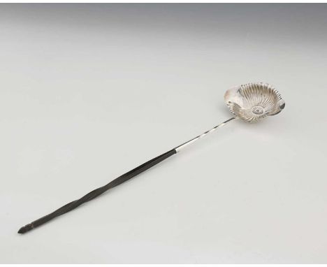 France.A nineteenth-century French first-standard (.950) silver toddy ladle, with a fluted navette-shaped bowl, and turned ha
